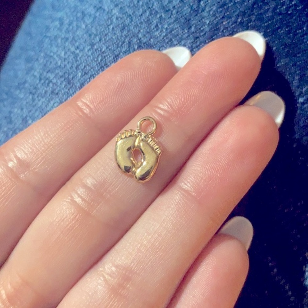 3/$30 gold plated foot print charm